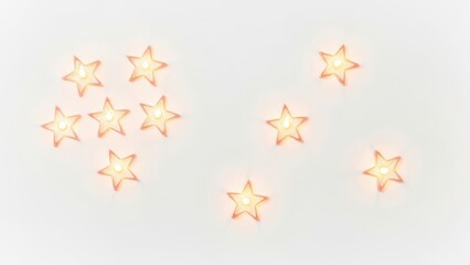 Close up of a white background with a cluster of nine lit up stars