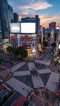 timelapse shibuya crossing japan pedestrian traffic circle street tokyo aerial panorama 4k japanese business