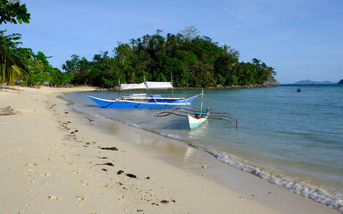 Beach and boats on Daracoton Island, Palawan, The Philippines