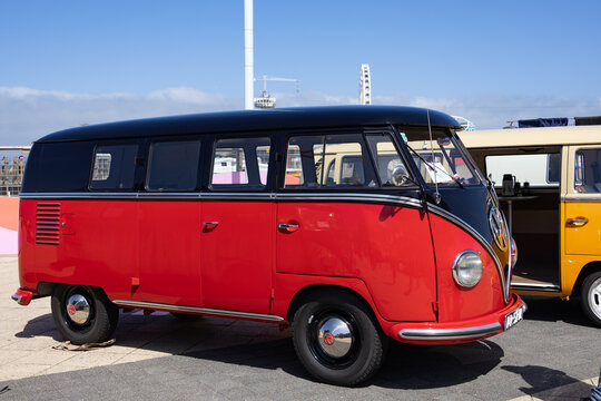 VW kombi camper vans on display at outdoor classic car show