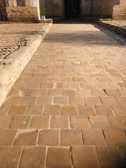 [Uzbekistan] Brown cobblestone road in Itchan Kala (Khiva)