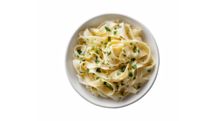 A bowl of fettuccine pasta tossed with herbs and sauce, served in a white bowl on a plain white background.