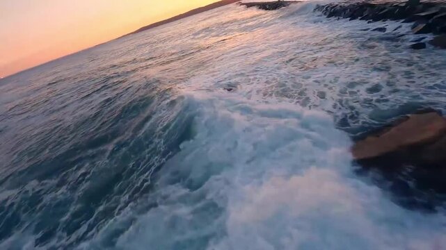 FPV Drone Aerial of Eastern Point Lighthouse at Sunset