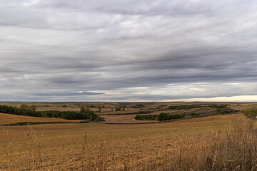 rural landscape with a cloudy sky, spain