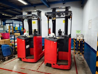 Forklift in Warehouse Red Industrial Vehicles © Yuliantini