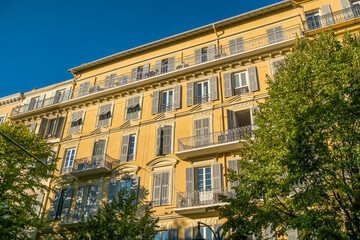 Beautiful facades of historic buildings in the center of Nice, Cote d'Azur, France.