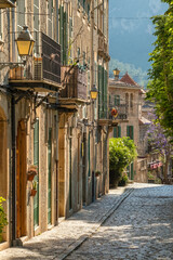 Picturesque narrow street in the Valdemossa town, Mallorca, Spain