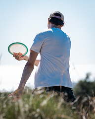 discgolfer is throwing a disc