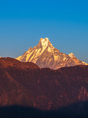 Naklejka premium Machapuchare, or fishtail mountain, in Annapurna Massif in Nepal at dusk