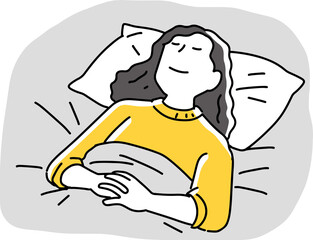 布団で寝る女性