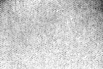 Abstract halftone dot pattern forming a gradient from dark to light in black and white, ideal for retro or comic-style designs.