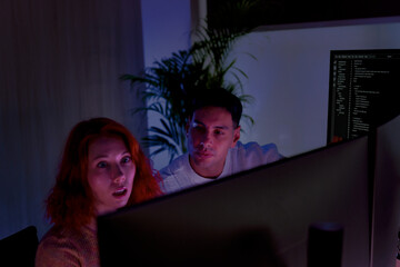 Two IT workers or programmers have face shock for found some error on monitor or coding wrong for IT process.