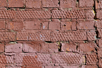 Old red brick wall texture made from textured bricks