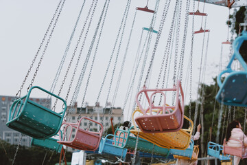 Fishing boats docked in a harbor by the river with sky and water surrounding them