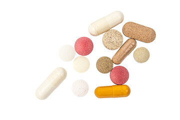 Various pills on white background