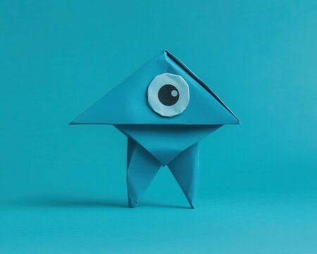 Origami cyclops with a single large folded eye, jagged edges, and a menacing stance