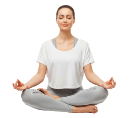 A woman in a white shirt and gray leggings meditates in a lotus position.