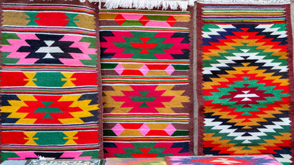 Traditional oriental Uzbek handmade colorful carpets at the bazaar in Uzbekistan in Tashkent