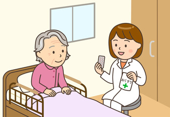 自宅のベッドサイドでおばあさんに服薬指導する女性薬剤師