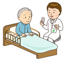 ベッドサイドでおじいさんに服薬指導する若い男性薬剤師