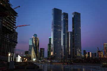 Naklejka premium High-rise buildings of the Moscow City business center on the banks of the Moskva River.