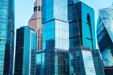 Obraz premium Skyscrapers of the Moscow City business center. Modern glass office buildings. Abstract background.