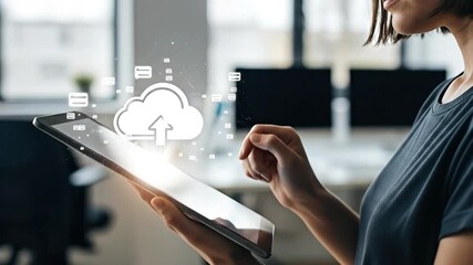 Young woman using a digital tablet for cloud data upload and storage, showcasing modern technology and business connectivity in an office setting. - Powered by Adobe