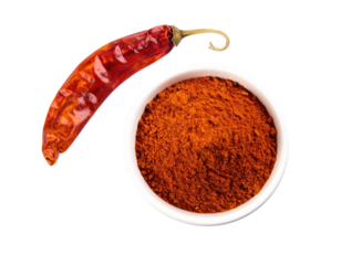 Chili pepper, dried whole & ground in bowl, dark backdrop