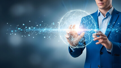 Businessman in blue suit interacting with glowing orb and particles