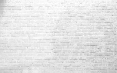 Fototapeta premium Old white brick wall background texture. Whitewashed brick wall, bright masonry texture as background 