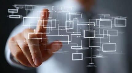 A close-up showcases a person's hand interacting with an abstract network of interconnected digital boxes and lines