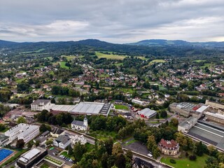 Obraz premium Ancient Town Center With Rooftops Captured, Panoramic Perspective Highlighting Historic Buildings And Streets