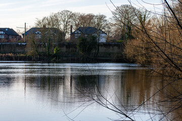 A beautiful sunrise over the waters of Iremongers Pond in Nottingham, UK.