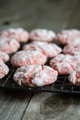 Homemade Strawberry and Red Velvet Crinkle Cookies on Cooling Rack. 