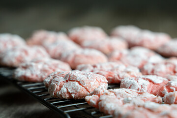 Homemade Strawberry and Red Velvet Crinkle Cookies on Cooling Rack. 
