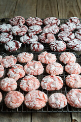 Homemade Strawberry and Red Velvet Crinkle Cookies on Cooling Rack. 