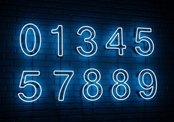 Blue neon numbers glow on a dark brick wall.