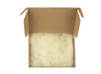 Sustainable packaging material natural waste leftover sheep wool. Soft wool inside brown cardboard box. Using natural sustainable material for wrapping or packaging, products background. 