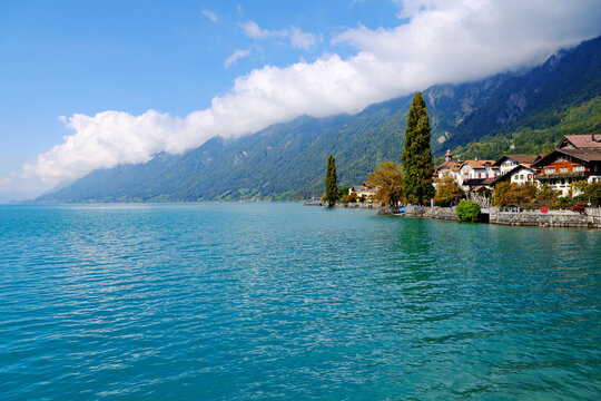 turquoise Lake Brienz and Brienz village under the Swiss Alps in Switzerland
