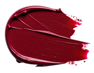 Glossy, dark red smeared beauty product on black background