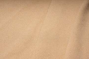 Close-up of cream ribbed cotton fabric