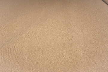 Close-up of cream ribbed cotton fabric