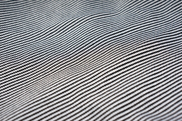 Close-up of thin cotton fabric with black and white stripes