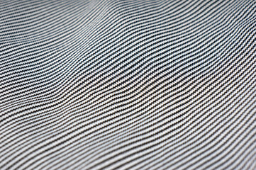 Close-up of thin cotton fabric with black and white stripes