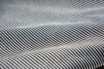 Close-up of thin cotton fabric with black and white stripes