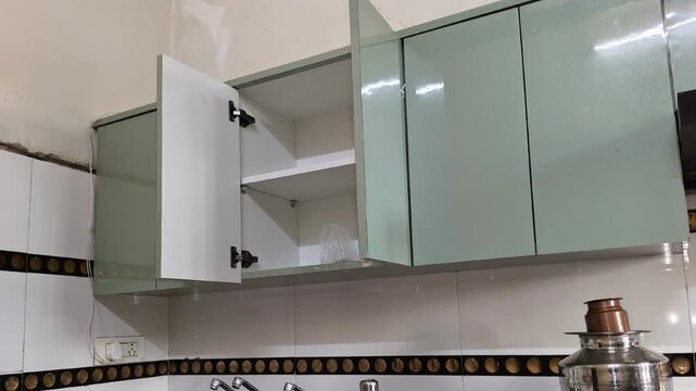 Minimalist High-Gloss Kitchen Cabinetry with Soft-Close Hinges