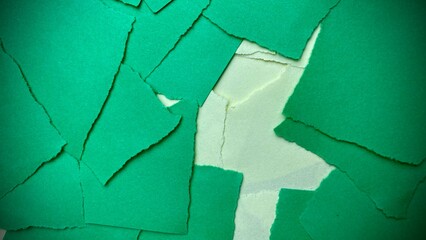 An abstract collage of torn green paper pieces revealing a glimpse of hidden space, conveying the essence of artistic deconstruction, raw texture and layers.