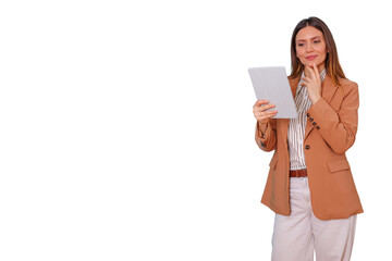 Businesswoman thinking, planning, and analyzing data on a tablet device with a hand on her chin, looking smart