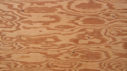 Light brown plywood grain texture background