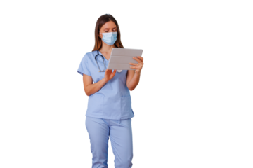 Medical professional in scrubs and mask using digital tablet, health care technology concept, cutout on transparent background